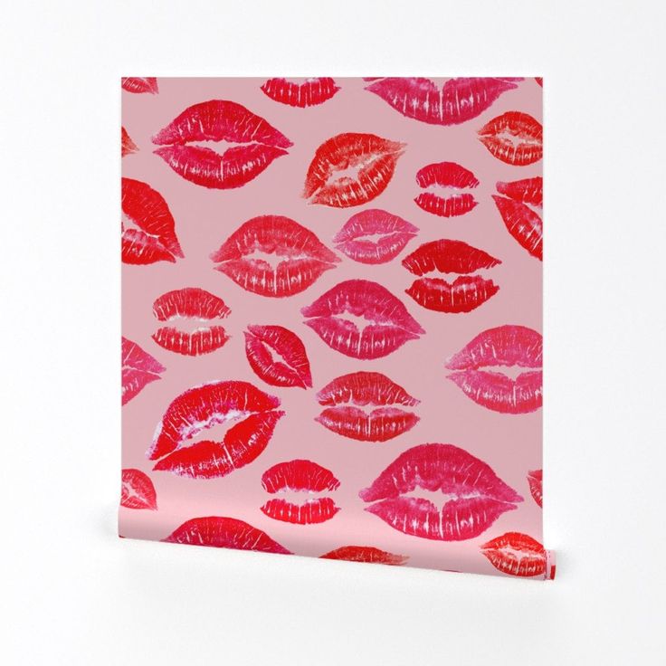 a pink box with red lipstick printed on it