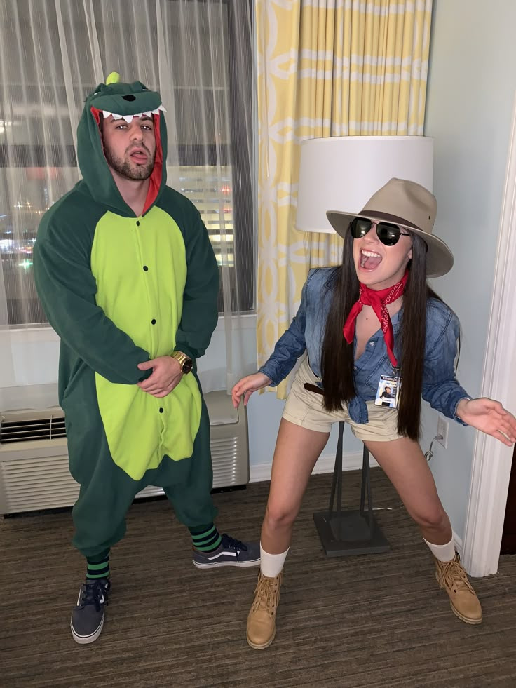 two people in costumes standing next to each other