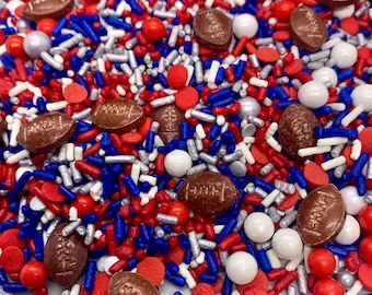 red, white and blue sprinkles are on the table