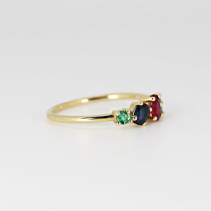 This beautiful cluster ring was made of 14k gold band, 14k gold prong settings. It's perfect as engagement ring or statement piece. DETAILS ABOUT THE RING, MATERIAL AND STONES * 14k 1.2 mm solid gold band and prongs. * 5x3.5 mm oval shape ruby * 4x3 mm oval sapphire * 4x3mm 0val emerald * 2.5mm round emerald * Birthstones : September, May, July We can make this design with any of gemstones. Please contact us. This ring was hand crafted in Melt'm Jewelry Studio in California. Thanks for visiting Emerald Cluster Ring, Emerald Birthstone Jewelry, Sapphire Cluster Ring, Ring Inspiration, Emerald Birthstone, Multi Gemstone Ring, Ring Sapphire, Solid Gold Band, Jewelry Studio