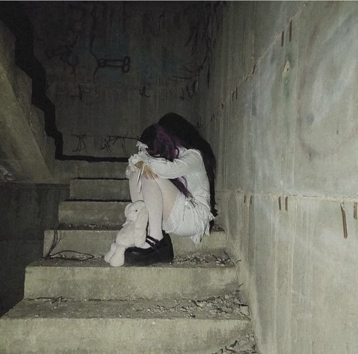 Girl on the floor at night Stairs