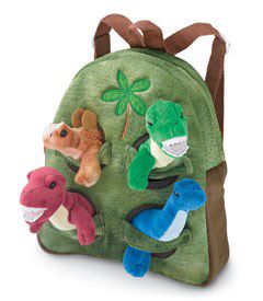 a green backpack with stuffed animals on the front and back pocket, attached to it