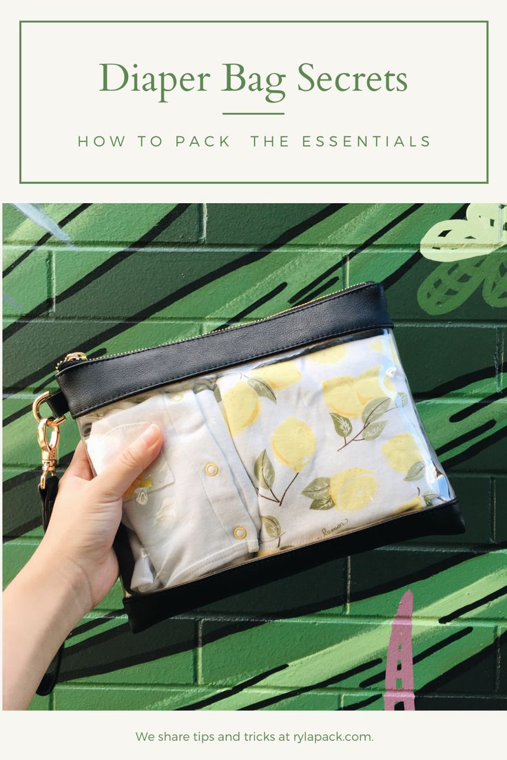 a hand holding a zippered pouch with lemons on it and the words, diaper bag secrets how to pack the essentials