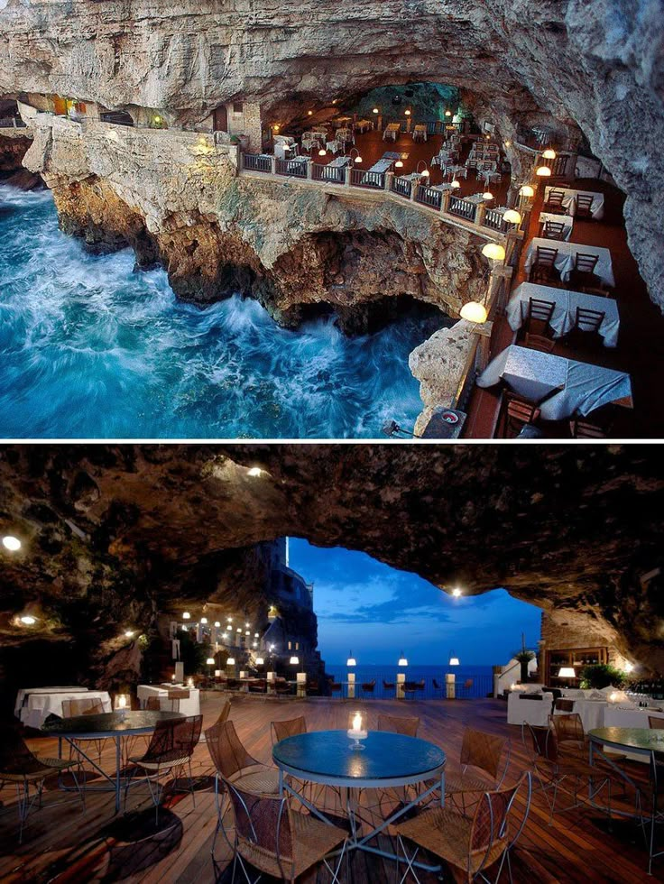 an outdoor dining area with tables and chairs next to the ocean in a cave restaurant