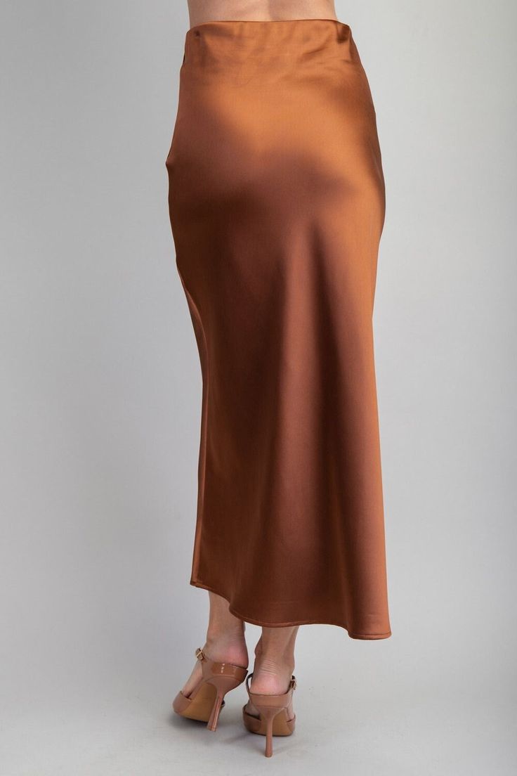 Upgrade your wardrobe with our trendy and versatile Midi Satin Skirt. Made from luxurious chocolate satin, this midi skirt will add a touch of sophistication to any outfit. Look stylish and feel comfortable with this must-have piece. Midi Satin Skirt, Chocolate Satin, Luxurious Chocolate, Blessing Dress, Now Or Never, Brown Satin, Satin Midi Skirt, Curvy Jeans, Capri Blue