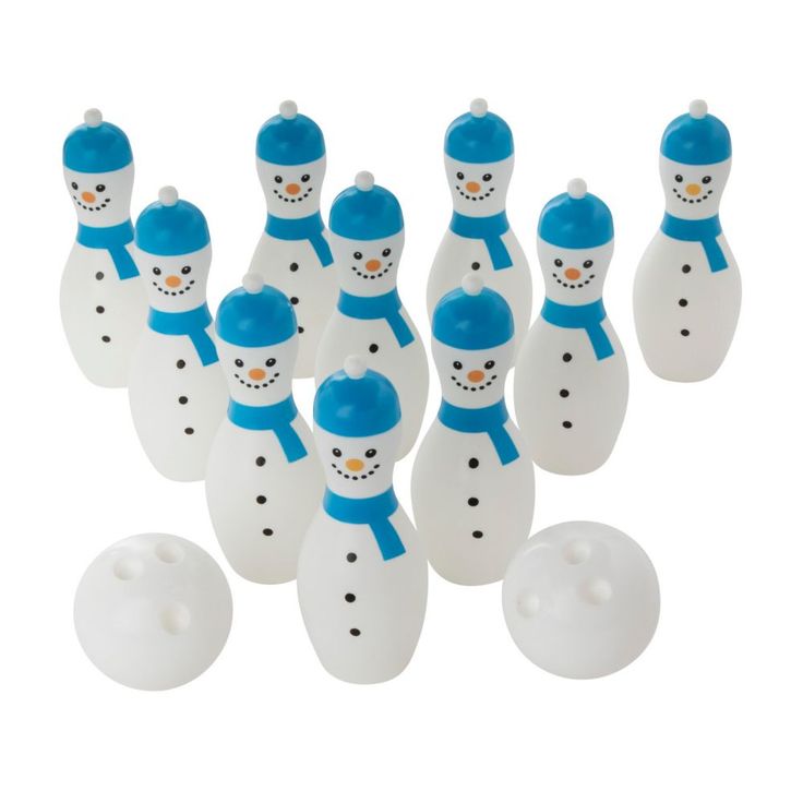 a group of white and blue bowling pins with snowmen on them