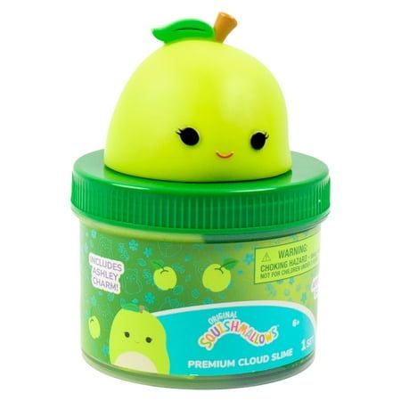 an apple shaped toy in a green container