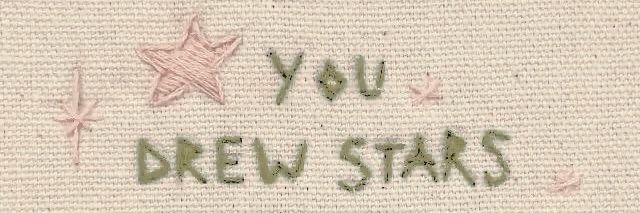 the words you drew stars are embroidered onto fabric