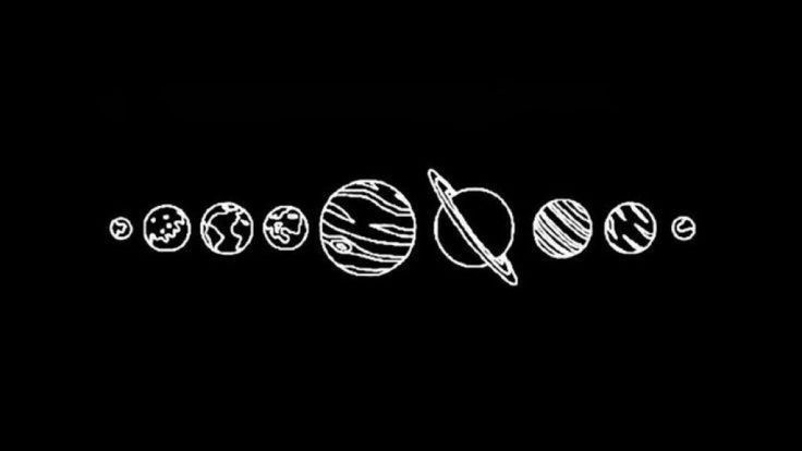 the solar system drawn in chalk on a black background