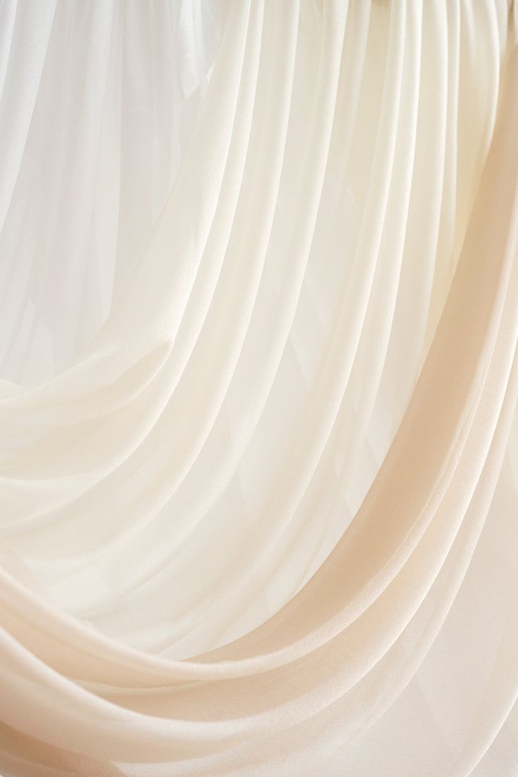 an abstract photo of white pleated fabric