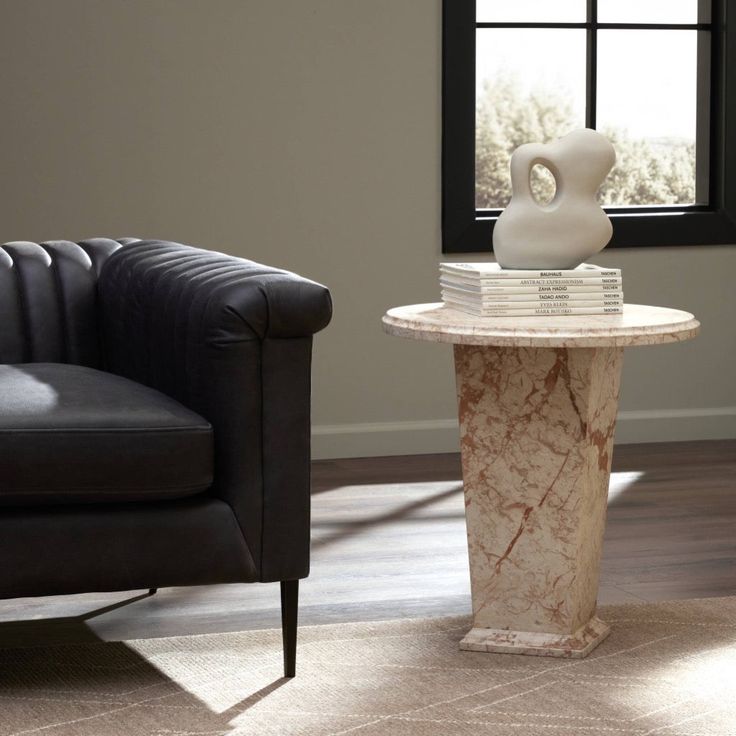 A versatile end table of taupe marble works a classic, sophisticated touch into any room. Marble End Tables, Drum Table, Cleaning Wood, Jamie Young, Dining Benches, Chelsea House, Side And End Tables, Italian Marble, Burke Decor