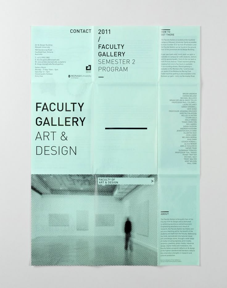 an art and design brochure is displayed on a white wall with a person walking in the background