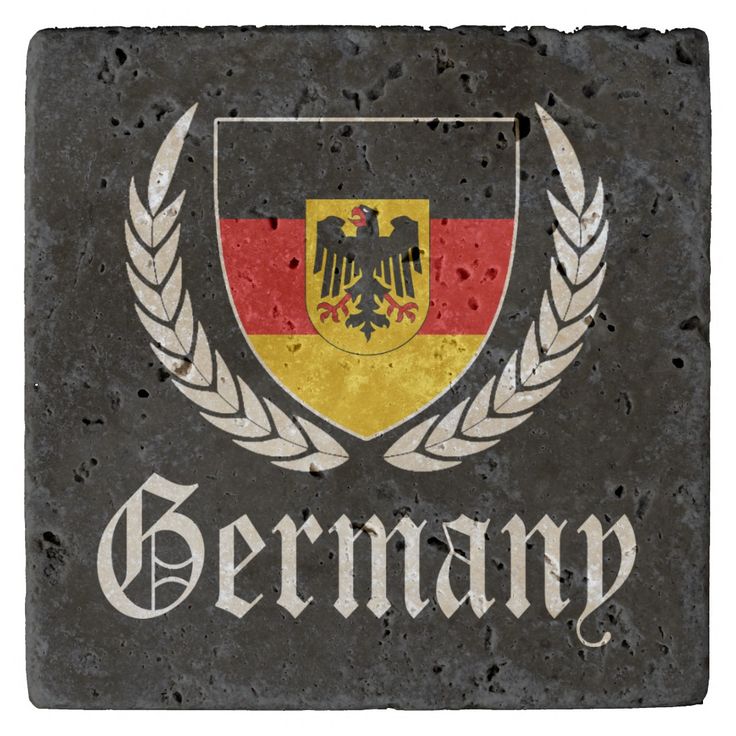 a stone sign with the german flag on it