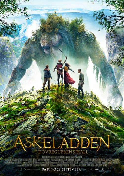 the movie poster for askeladden, featuring three people standing on top of a mountain