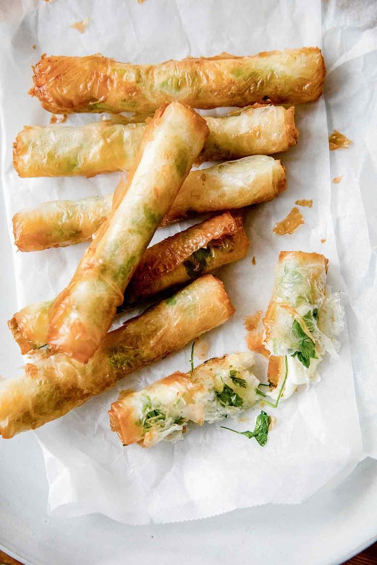 some food is laying out on a white paper plate and it looks like they have been fried