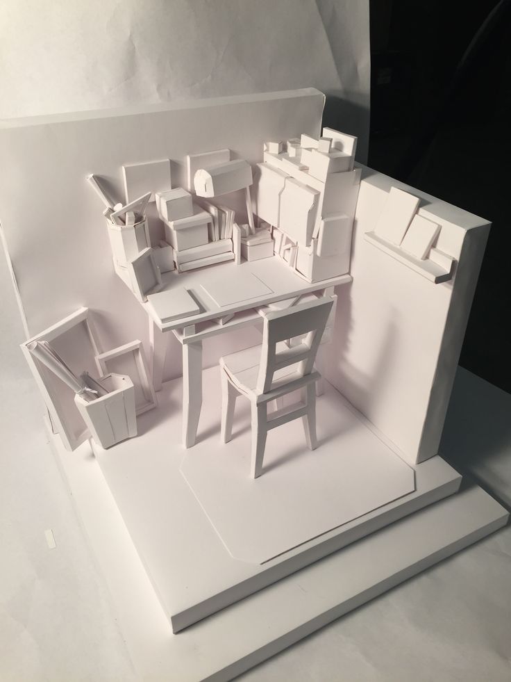 a paper model of a table and chairs in a room that is cut out to look like a house