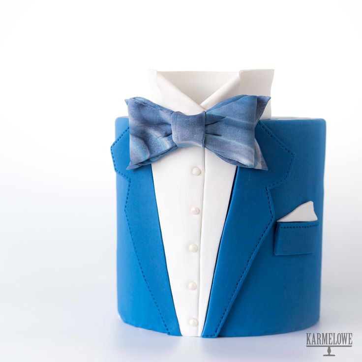 a blue and white canister with a bow tie on it's lapel