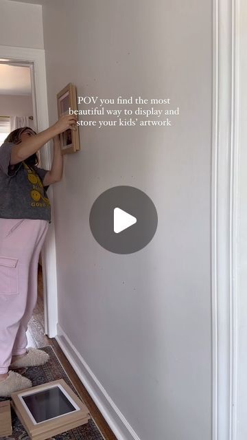 a man is painting the wall in his house