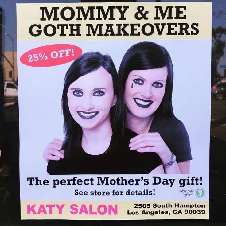 a sign advertising mother's day gifts in front of a store window with two women smiling