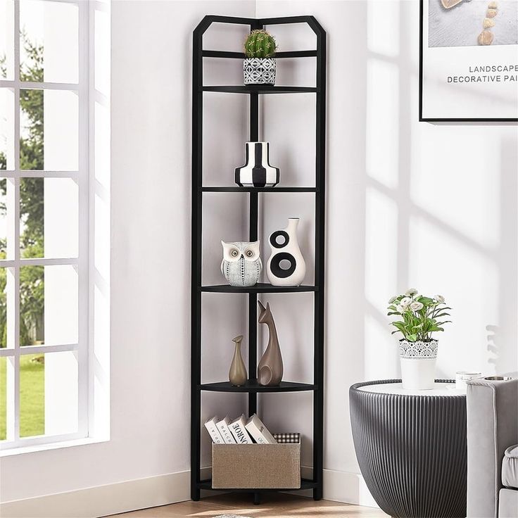 a corner shelf with vases and other items on it in a white living room