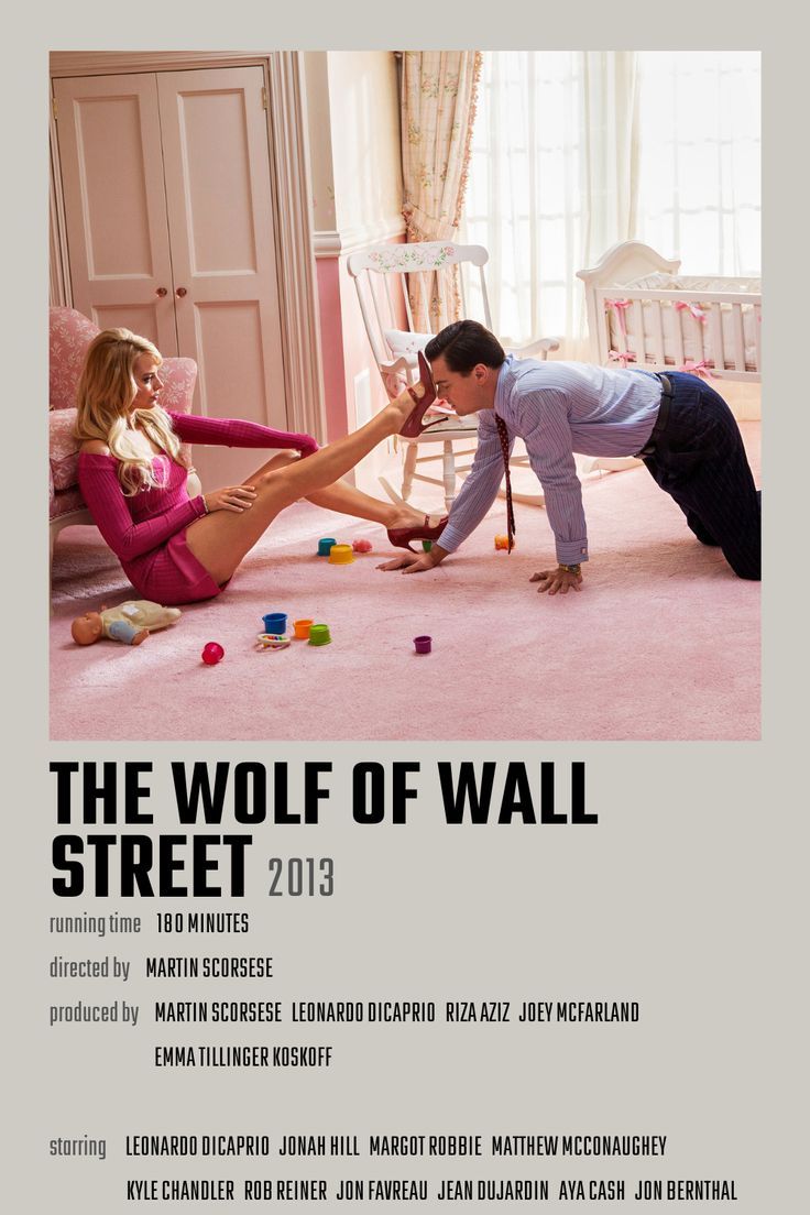 the wolf of wall movie poster with two people playing on the floor and one man leaning over