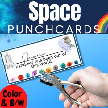 a pair of scissors is being used to cut a card with space punchcards on it