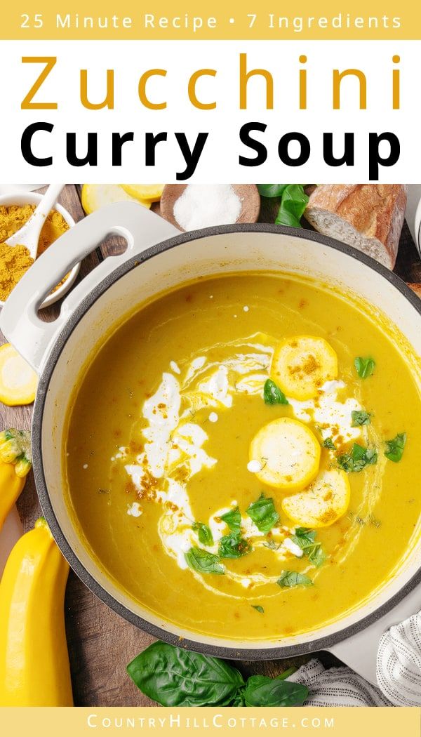 zucchini curry soup in a white bowl on a wooden table with bananas and other ingredients