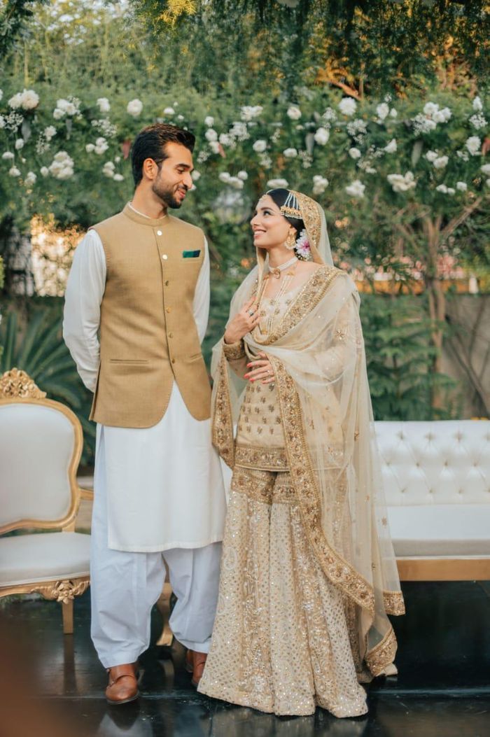 a man and woman standing next to each other