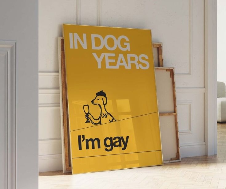 a yellow sign that says in dog years i'm gay