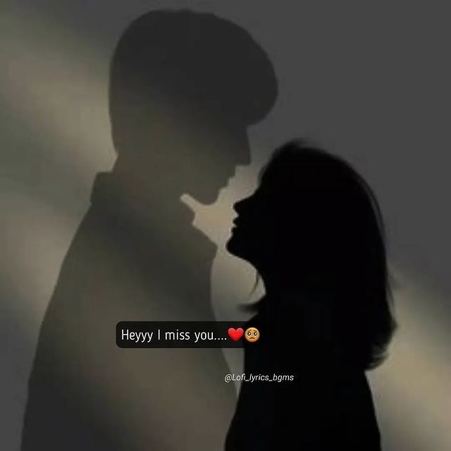 the silhouette of a man and woman in front of a dark background with text that reads, happy i miss you