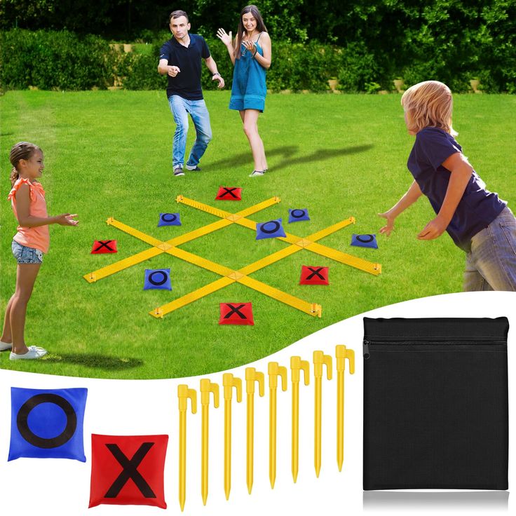 two children and an adult are playing games in the grass