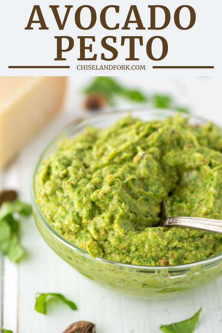 avocado pesto in a glass bowl with a spoon