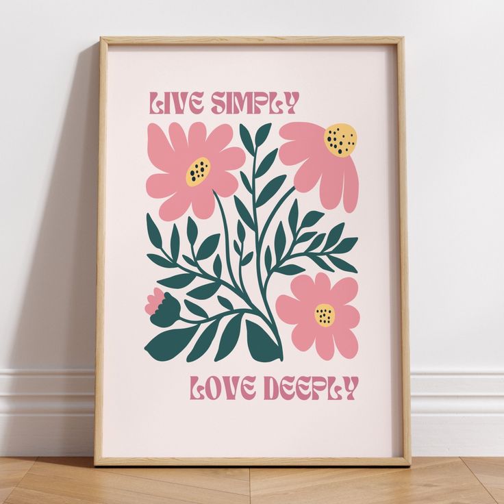 a pink and green floral print with the words live simply, love deeply on it