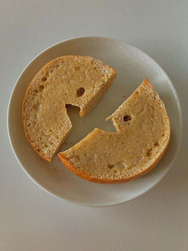 a white plate topped with slices of bread