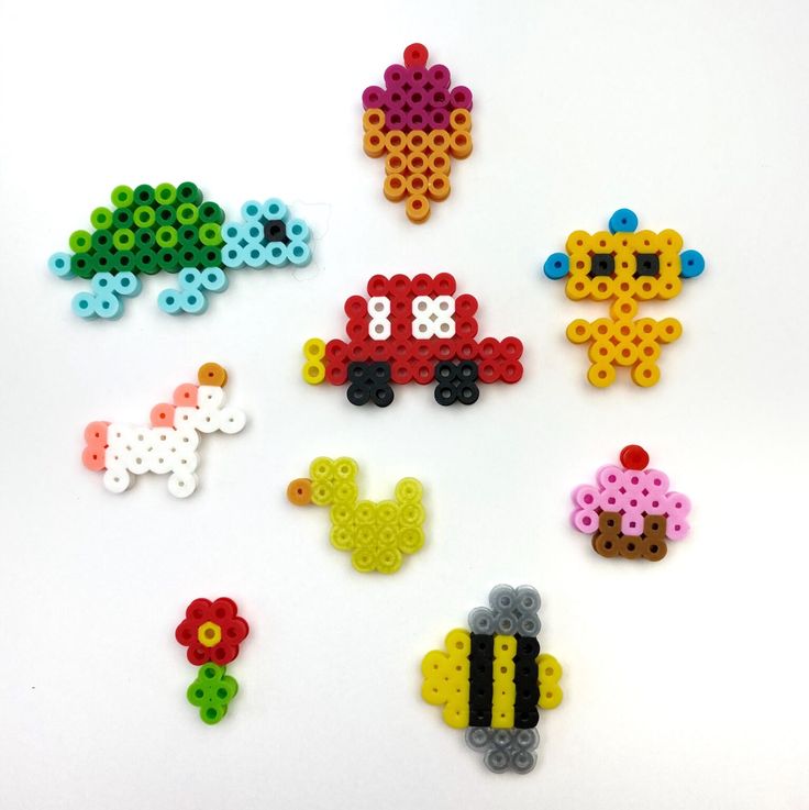 six different types of bead designs on a white surface