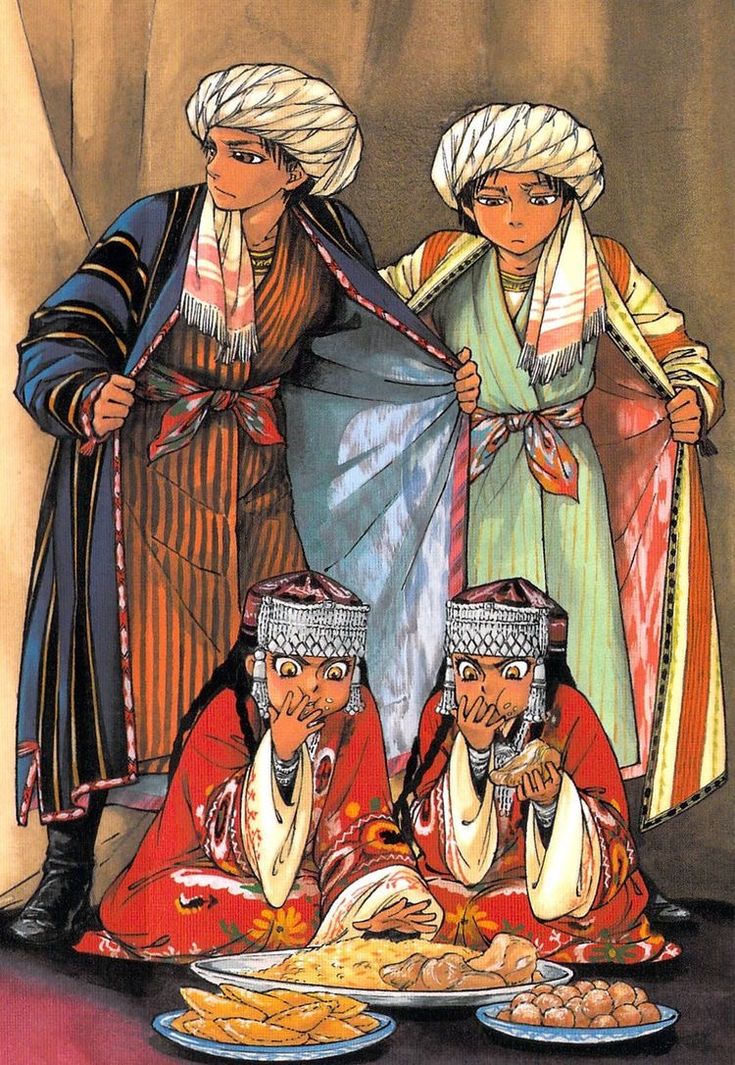 three women dressed in traditional clothing standing next to each other with food on the table