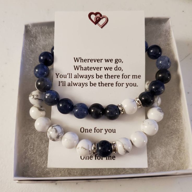 two bracelets with one for you and the other for me on display in a box