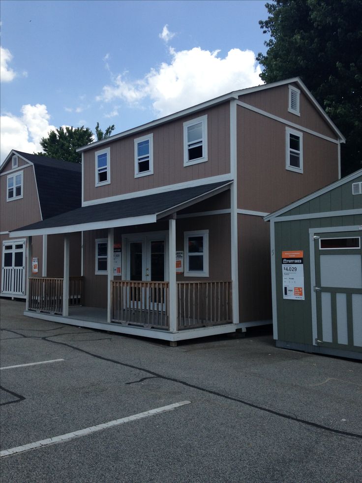 two garages are shown in front of each other