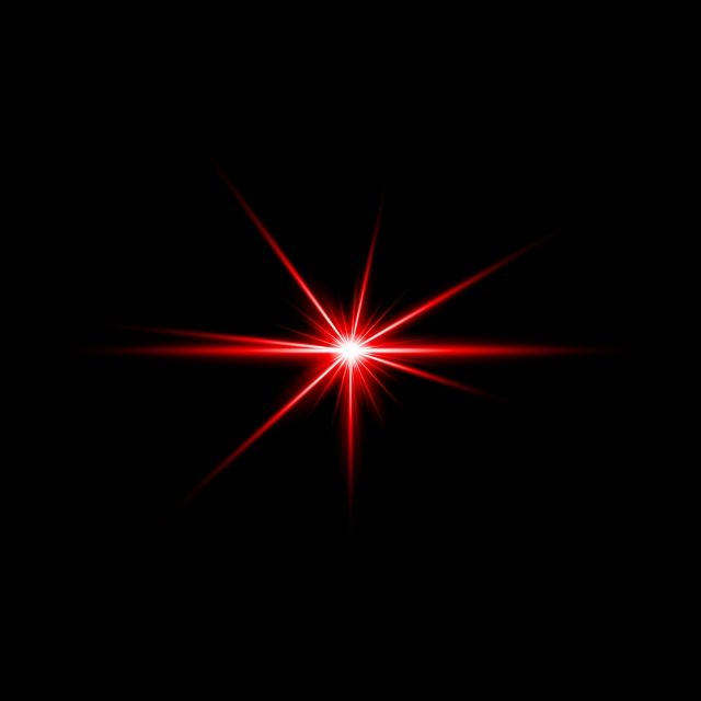 a red star shines brightly in the dark sky with its light shining through it