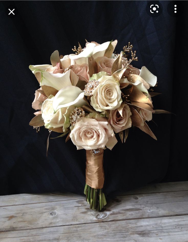 a bridal bouquet on a wooden table