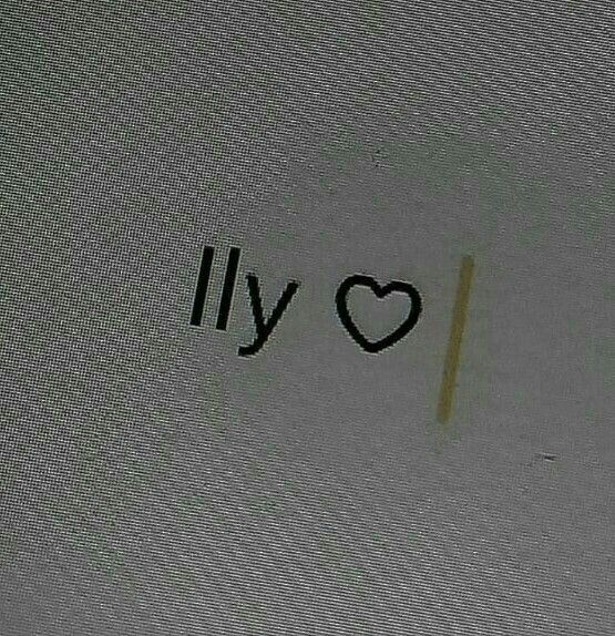 i love lily written in black ink on a white paper with a gold stripe and heart