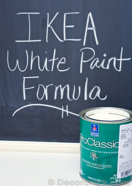 a can of paint next to a chalkboard with the words i like a white paint formula written on it