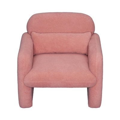 a pink chair sitting on top of a white floor