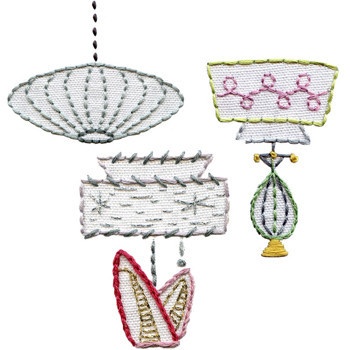 three different types of ornaments hanging from strings