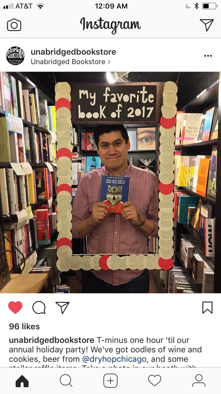 a man holding up a book in front of a photo frame that reads my favorite book of 2017