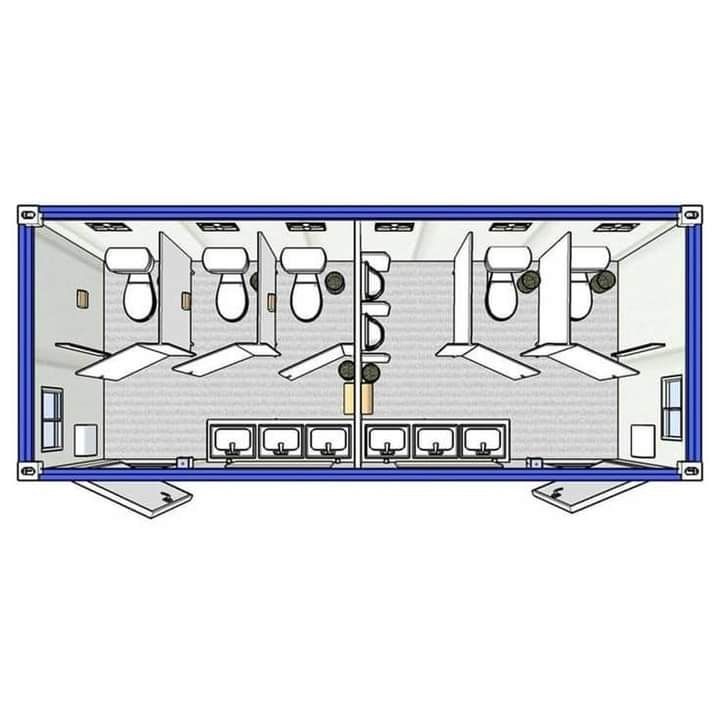 an overhead view of the floor plan for a small airplane with four seats and two toilets