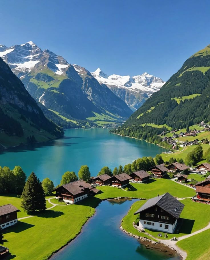 a lake surrounded by mountains and houses