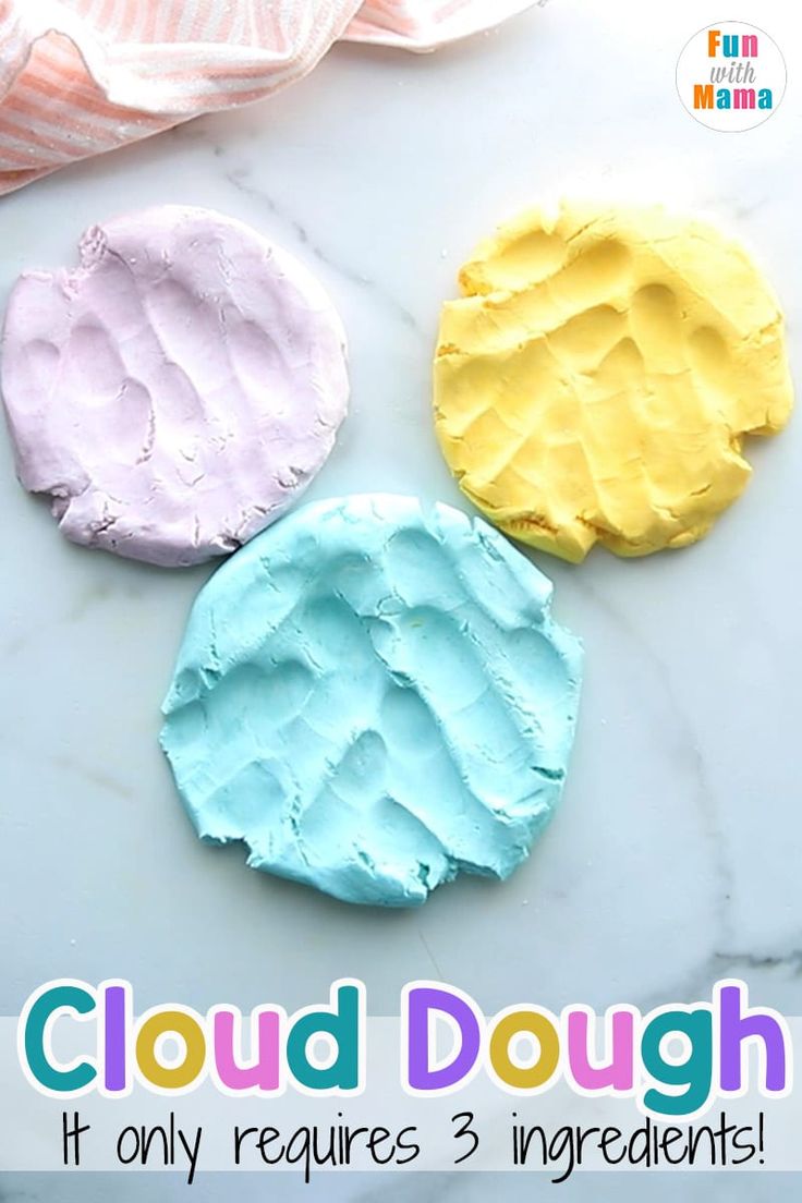 three different colored doughs sitting on top of a white marble counter with text overlay that reads cloud dough it only requires 3 ingredients