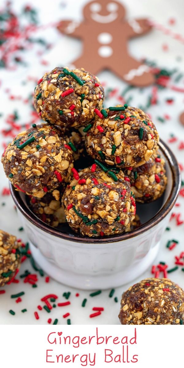 gingerbread energy balls in a white bowl with christmas sprinkles on the side