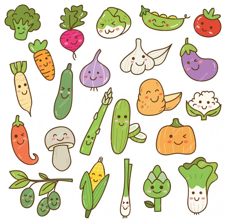 an assortment of vegetables with faces drawn on them